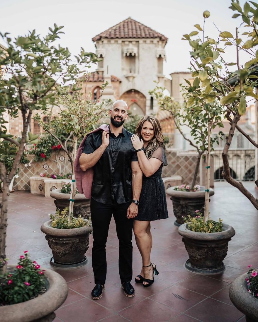 Couple at their engagement shoot on a terrace
