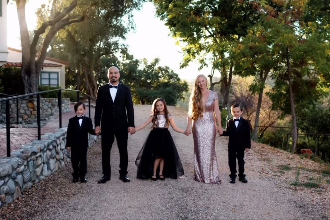 Formal family portrait with long blonde waves and glam makeup